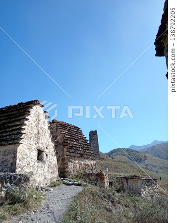 Dargavs City of the Dead, North Ossetia, Russia. Ancient burial complex with traditional stone architecture in a remote mountain setting Dargavs City of the Dead, North Ossetia, Russia. Ancient burial complex with traditional stone architecture in a remote mountain setting 138792205