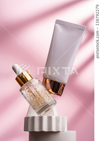Luxury skincare with serum and SPF cream on pink background 138792279