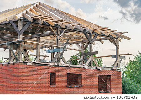House construction of red brick first floor and wooden structure for the second floor House construction of red brick first floor and wooden structure for the second floor 138792432