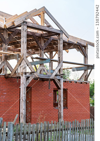 Construction site of an unfinished entrance area of an abandoned cottage in rural setting Construction site of an unfinished entrance area of an abandoned cottage in rural setting 138792442