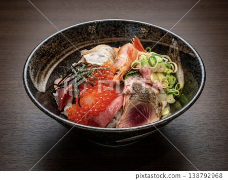 Bowl of rice topped with sashimi Bowl of rice topped with sashimi 138792968