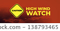 High Wind Watch Warning Yellow Caution Sign Floating Against Dramatic Red Orange Stormy Sky 138793465