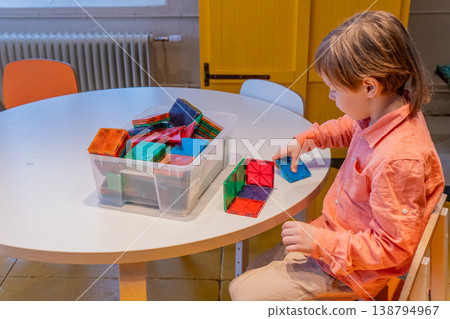 Child Learning with Colorful Building Blocks and Magnetic Tiles. Child Learning with Colorful Building Blocks and Magnetic Tiles. 138794967