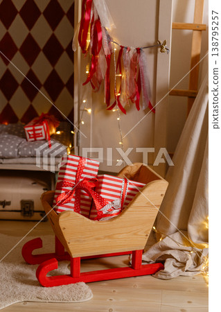 Rustic Seasonal Decor Arrangement. Charming Rustic Christmas Setup With Lights And Gifts Rustic Seasonal Decor Arrangement. Charming Rustic Christmas Setup With Lights And Gifts 138795257