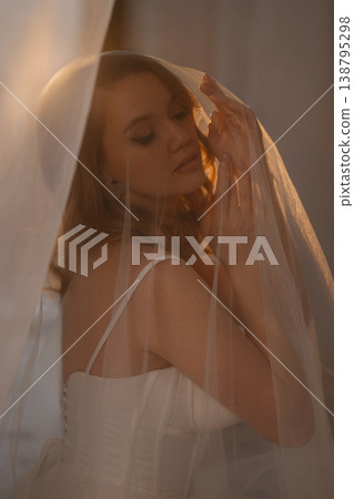 Intimate Shot Of Bride Showcasing Delicate Hands Bathed In Soft Lighting During Sunset 138795298