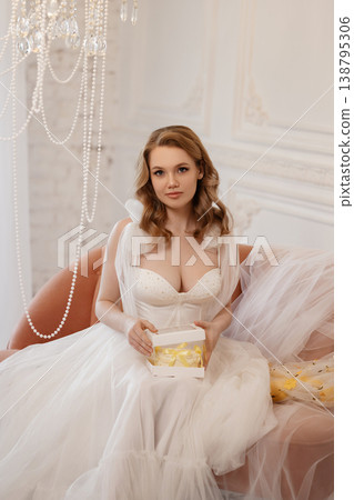 Joyful Bride With Cake And Smile. Bride Enjoys Intimate Birthday With Bright Candlelight Joyful Bride With Cake And Smile. Bride Enjoys Intimate Birthday With Bright Candlelight 138795306