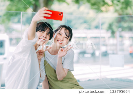 Women taking selfies on a girls' trip Women taking selfies on a girls' trip 138795664