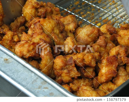 Kitchen preparation at a popular bento shop with long lines 01 138797379