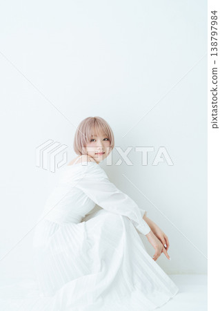 Beauty and fashion image of a woman with light-toned short bob hair. 138797984