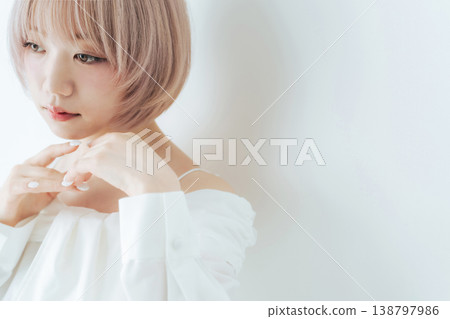 Beauty and fashion image of a woman with light-toned short bob hair. 138797986