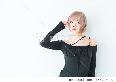 Beauty and fashion image of a woman with light-toned short bob hair. Beauty and fashion image of a woman with light-toned short bob hair. 138797990