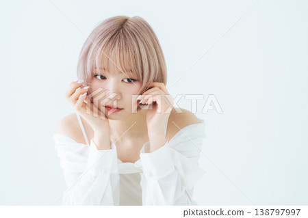 Beauty and fashion image of a woman with light-toned short bob hair. 138797997