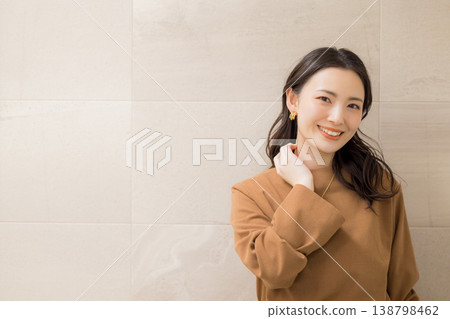 Young woman checking her skin condition in the bathroom Young woman checking her skin condition in the bathroom 138798462