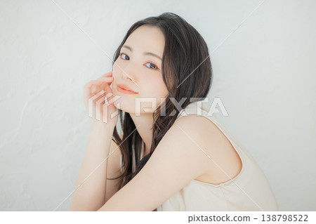 Young woman with long hair Young woman with long hair 138798522