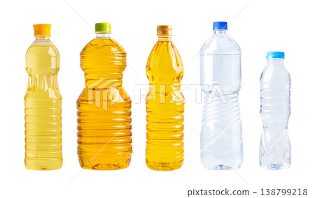 Vegetable oil and water in different bottle for cooking isolated on white background. Vegetable oil and water in different bottle for cooking isolated on white background. 138799218