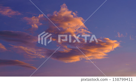 a panoramic view of purple pink orange sunset sky with big cumulus clouds, at evening,Tokyo, Japan a panoramic view of purple pink orange sunset sky with big cumulus clouds, at evening,Tokyo, Japan 138799411