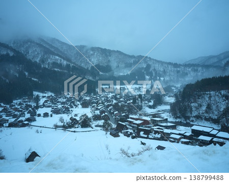 A panoramic view of the Shirakawa-go Gassho-zukuri village in winter snow. A panoramic view of the Shirakawa-go Gassho-zukuri village in winter snow. 138799488