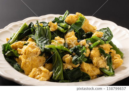 Sautéed spinach and eggs in butter Sautéed spinach and eggs in butter 138799837