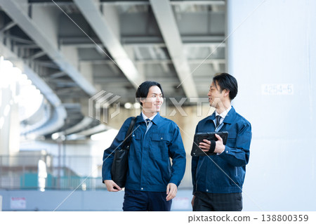 Engineers having a conversation 138800359