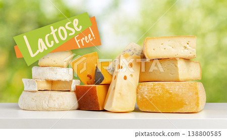 Variety of lactose free cheeses displayed on a table in natural light outdoors Variety of lactose free cheeses displayed on a table in natural light outdoors 138800585
