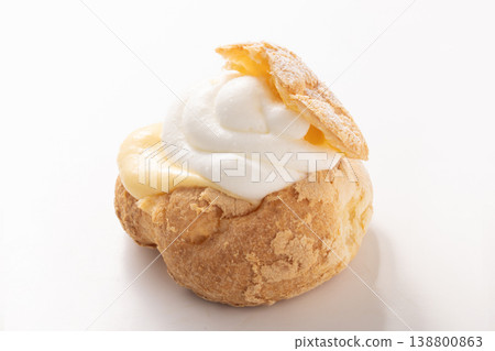 Double cream puff with custard and whipped cream Double cream puff with custard and whipped cream 138800863