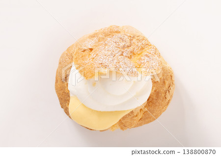 Double cream puff with custard and whipped cream Double cream puff with custard and whipped cream 138800870