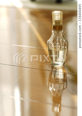 Small bottle of fragrance 138800895