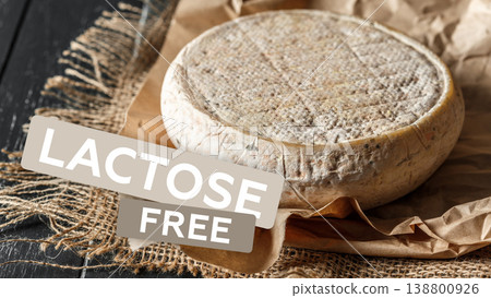 Cheese on brown paper with label indicating it is lactose and gluten free 138800926