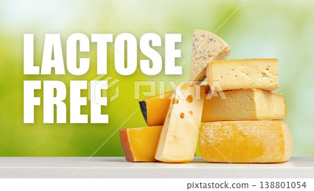 Lactose free cheese stacked on a table with a green background and text display Lactose free cheese stacked on a table with a green background and text display 138801054