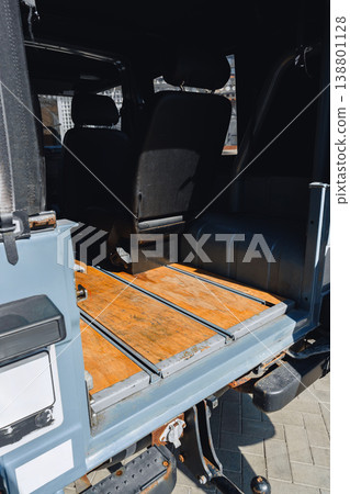 Inside view of a vehicle with wooden flooring in the storage area Inside view of a vehicle with wooden flooring in the storage area 138801128