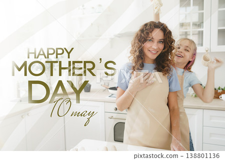 Celebrating Mother's Day with baking and smiles on May 10th in a cozy kitchen atmosphere Celebrating Mother's Day with baking and smiles on May 10th in a cozy kitchen atmosphere 138801136