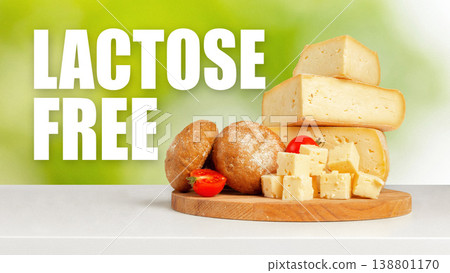 Healthy snacks with lactose free cheese and bread on a wooden board in a bright setting Healthy snacks with lactose free cheese and bread on a wooden board in a bright setting 138801170