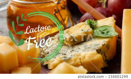 Enjoying lactose gluten free cheese with honey and grapes on a wooden table Enjoying lactose gluten free cheese with honey and grapes on a wooden table 138801299