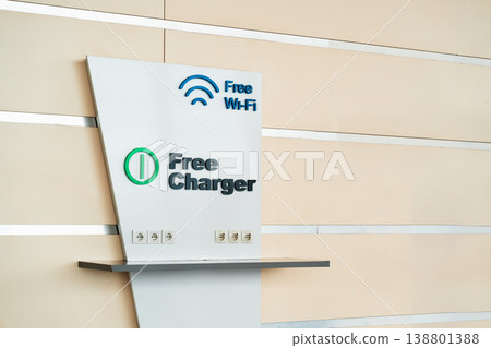 Free Wi-Fi and charging station in a modern indoor space for visitors Free Wi-Fi and charging station in a modern indoor space for visitors 138801388