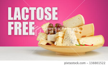 Lactose gluten free cheese served on a wooden platter with grapes Lactose gluten free cheese served on a wooden platter with grapes 138801522