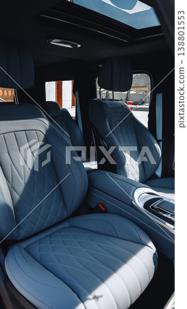 Luxury car interior shows modern design and comfortable seating Luxury car interior shows modern design and comfortable seating 138801553