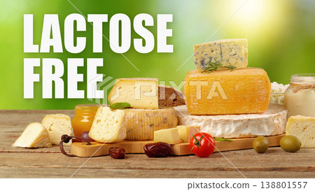 Lactose free cheese display with various types of cheese and fresh ingredients on wooden table Lactose free cheese display with various types of cheese and fresh ingredients on wooden table 138801557