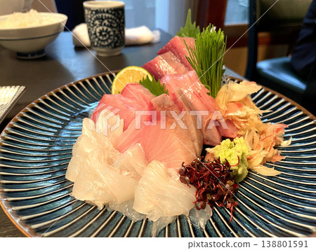 Assorted sashimi: Bonito, Yellowtail, Amberjack, Flounder 138801591
