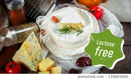 Selection of lactose and gluten free cheeses with fresh herbs and ingredients on a wooden table Selection of lactose and gluten free cheeses with fresh herbs and ingredients on a wooden table 138801600