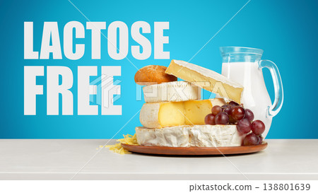 Lactose free dairy products and fruits on a table with a blue background Lactose free dairy products and fruits on a table with a blue background 138801639