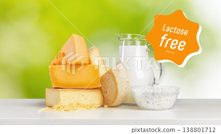 Lactose free dairy products on a table with a pitcher of milk and cheese blocks 138801712