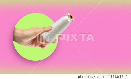 Hand holding bottle of milk for lactose and gluten free diet on bright background Hand holding bottle of milk for lactose and gluten free diet on bright background 138801841