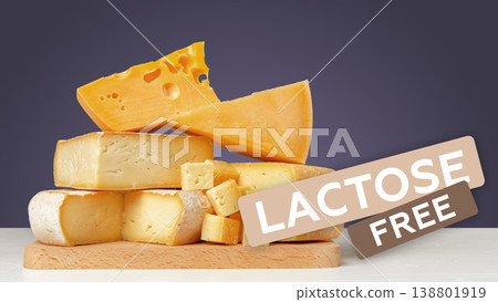 Different types of cheese arranged on a cutting board with a lactose free label Different types of cheese arranged on a cutting board with a lactose free label 138801919