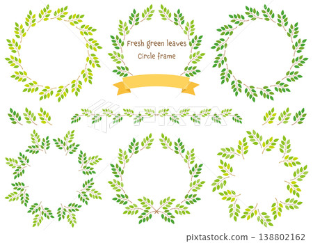 一個天然花環狀的圓形相框，周圍環繞著新鮮的綠葉。 138802162