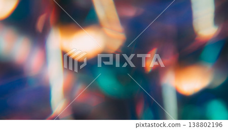Blur beam prism. Gradient neon flare. Vivid colorful light crystal lens on dark background. Vibrant orange green blue abstract reflection. Blur beam prism. Gradient neon flare. Vivid colorful light crystal lens on dark background. Vibrant orange green blue abstract reflection. 138802196