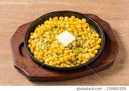Corn butter: A popular izakaya (Japanese pub) menu item that offers both sweetness and richness. 138802326
