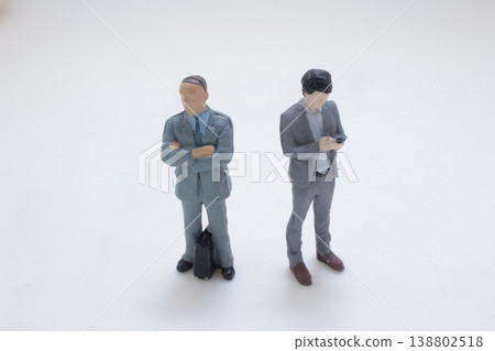 Miniature Business Figures Standing Apart Concept Miniature Business Figures Standing Apart Concept 138802518