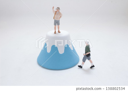 Miniature Figures Climbing Abstract Mountain Peak Miniature Figures Climbing Abstract Mountain Peak 138802534