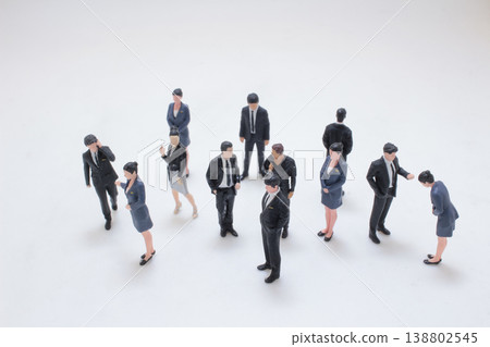 Group Of Miniature Business People Arrangement Group Of Miniature Business People Arrangement 138802545