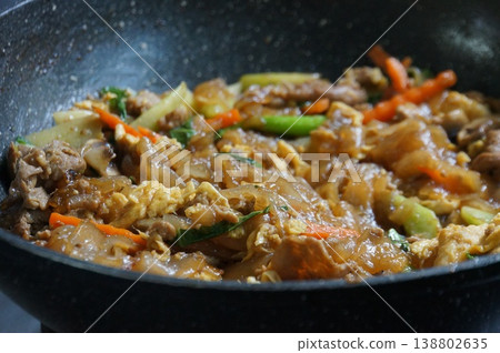 Thai Pad See Ew or Stir-fried Flat Rice Noodles with Marinated Pork and Dark Soy Sauce, Selective Focus 138802635